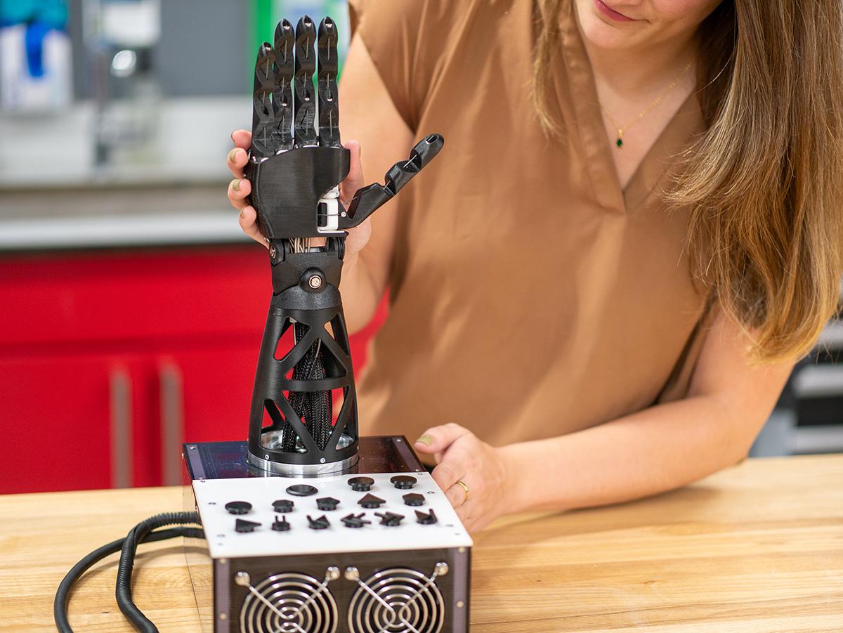Samantha Johnson demonstrates how to use the T1 Fingerspelling robot