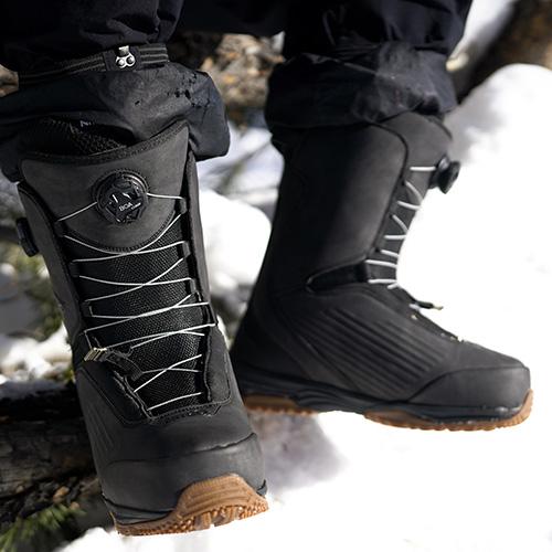 close up on BOA snow boots on person
