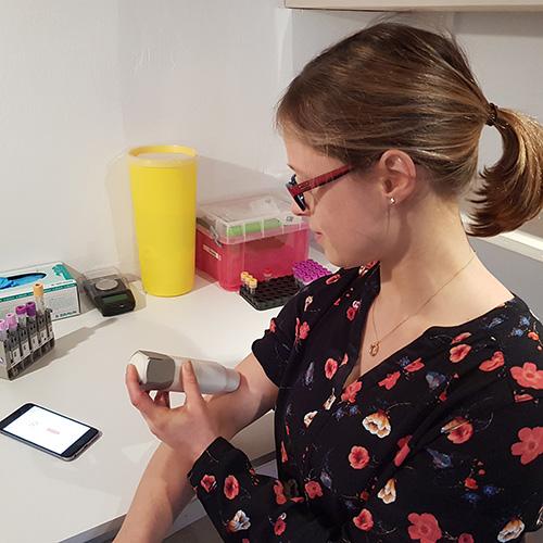 woman using Loop Medical device