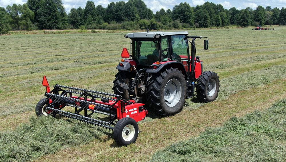 Norden AlfaTed fluffing tedder in a field.