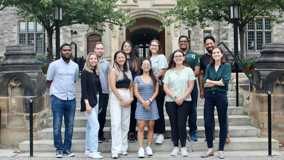 Dr. Alison Olechowski stands with her Tufts research group.