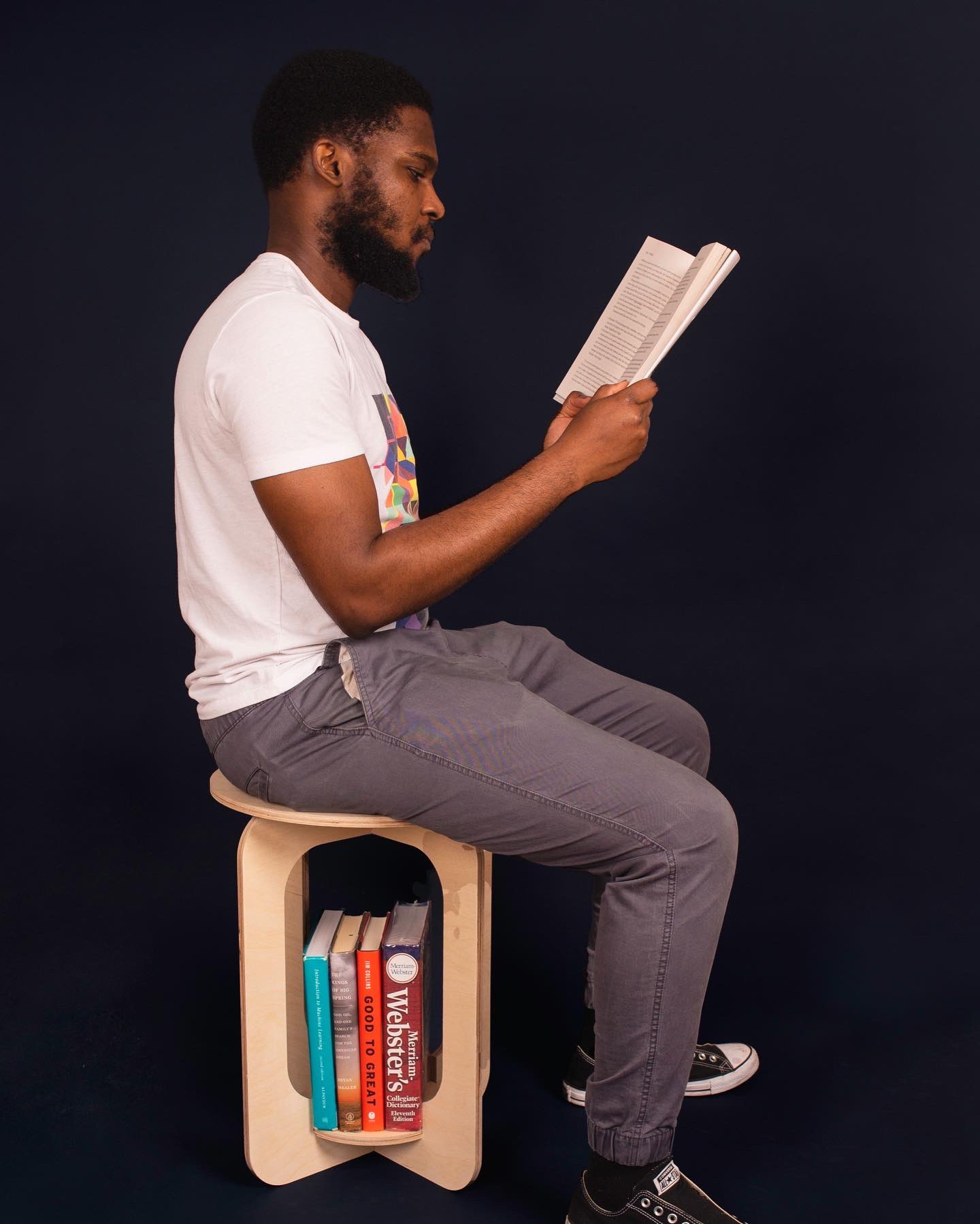 Chukwuma Asuzu sitting on the Noro stool