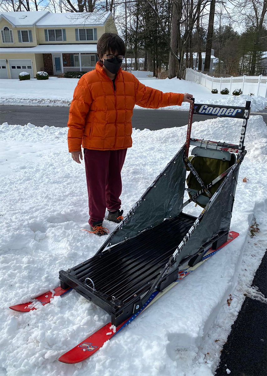 Student with the finished sled